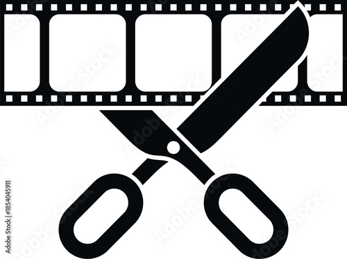 Scissors cutting film strip representing video editing, movie production, and media creation
