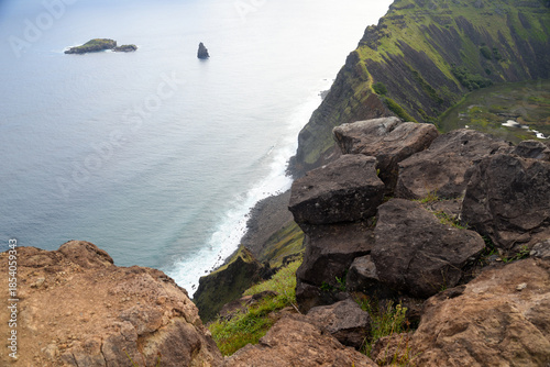 Majestic Rano Raraku cliffs and greenery with vast ocean backdrop