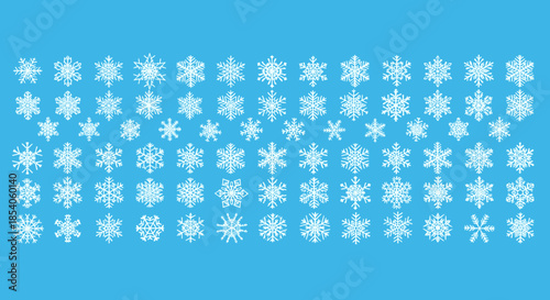 Numerous white snowflake icons with various unique crystalline designs displayed on a solid blue background for winter graphic projects.