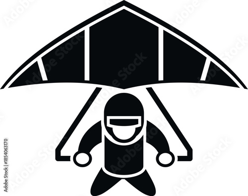 Hang glider flying high representing adventure and freedom