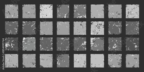 A grid of grayscale abstract textures resembling distressed or fragmented surfaces