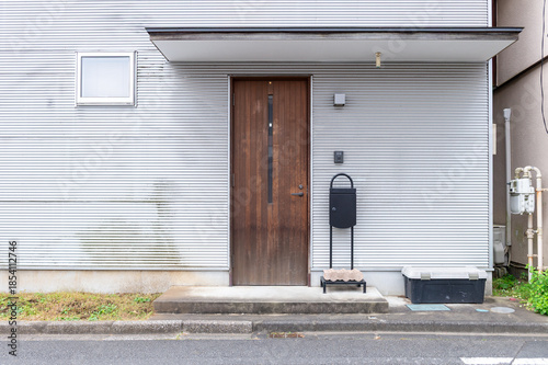 sidewalk by street wall  and  door