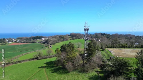 Torquay, Torbay, South Devon, England: DRONE VIEWS: Circling shots of a transmitter and a water reservoir on Great Hill; the communications mast brings television and mobile services to Torbay.