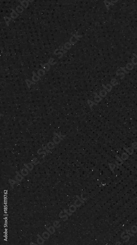 Black metal surface texture with scratches and marks