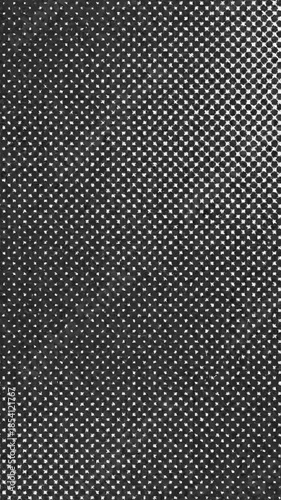 Close-up of metal screen with small round holes