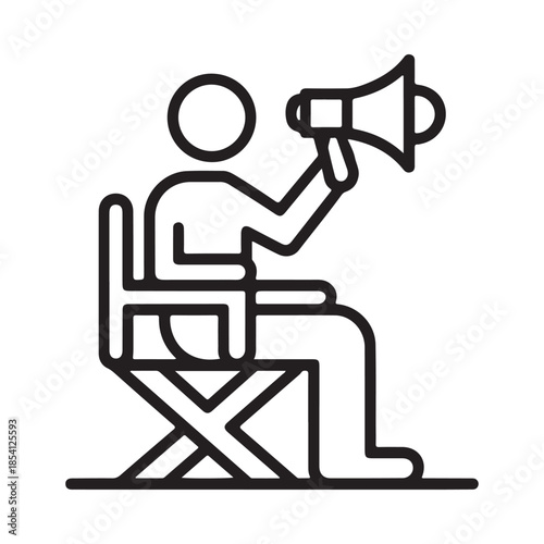 A director sits in a chair giving instructions through a megaphone