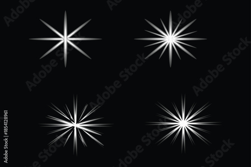Set of white starburst lens flare light effects isolated on black background 