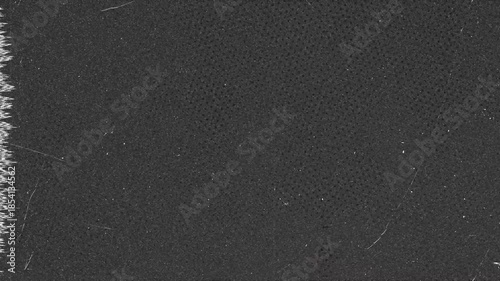 Old black texture with noise and scratches for abstract usage