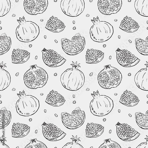 Hand drawn whole and halved pomegranates with scattered seeds. Pomegranate seamless pattern. Packaging paper design. Vector sketch illustration in vintage crayon charcoal style