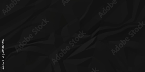 Crumple crushed black paper obsolete rumple craft design. wrinkle ripped creased crumple aged closeup recycled document grunge paper background.