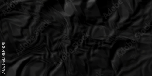 Crumple crushed black paper obsolete rumple craft design. wrinkle ripped creased crumple aged closeup recycled document grunge paper background.