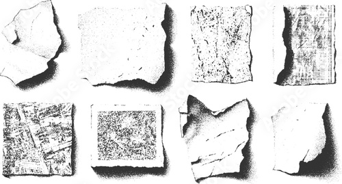 Eight torn paper scraps with stippled textures and shadows