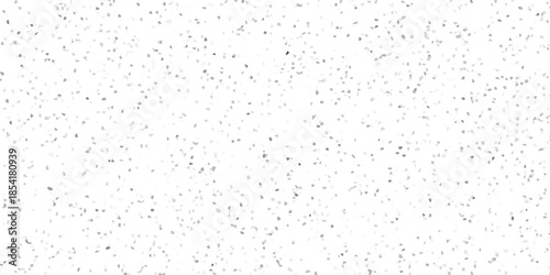 Subtle mosaic pattern of scattered small irregular gray and white fragments creating a textured speckled abstract background for design and decoration