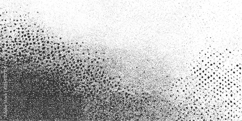 Black and white speckled gradient texture with irregular dots and clusters background