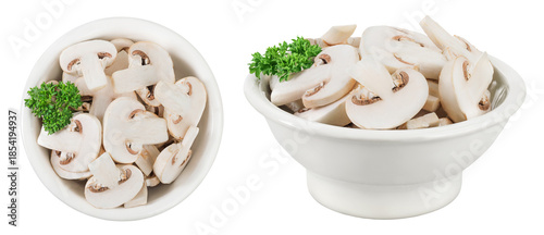Fresh mushroom champignon slices in a ceramic bowl isolated on white background. Top view. Flat lay