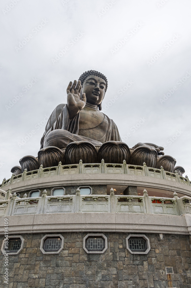 Fototapeta premium TIan Tan buddha at the Po Lin monastery in Ngong Ping, Lantau island Hong Kong, China. 23 May 2025