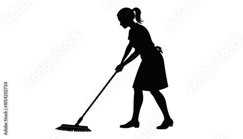 Silhouette of a woman mopping the floor with a broom.