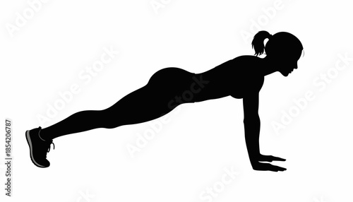 Silhouette of a woman doing a plank exercise for fitness and strength.
