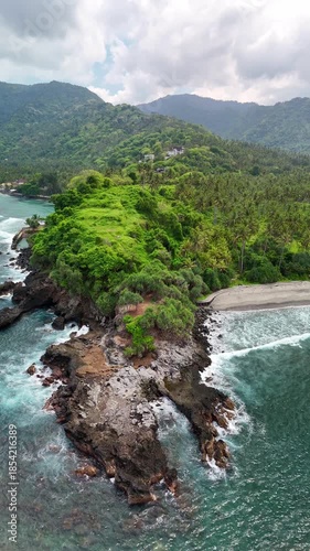 Lombok island area in Indonesia. Surrounded by jungle and palm trees. Aerial videos.