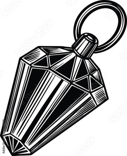 Black and white geometric keychain with a faceted gemstone shape