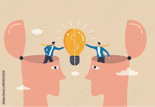 Understanding lead to success, agreement or think together to find solution to solve problem, insight or team communication concept, businessmen partner open their head to connect lightbulb jigsaw.