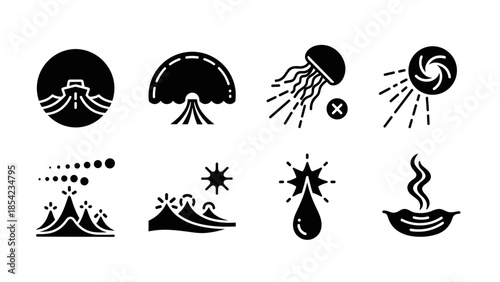 Natural disaster icons set featuring volcanic eruptions, tsunamis, and earthquakes in bold silhouette style