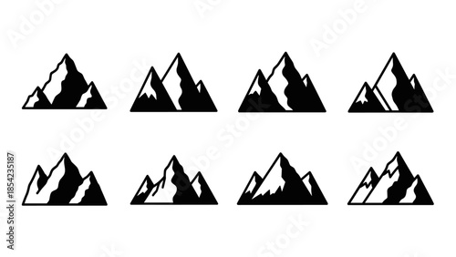 Set of eight mountain silhouettes with alpine peaks and snowcaps