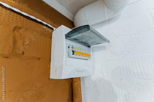 open electrical panel, accessible wiring and switches, electrical components and wiring are visible and accessible, viewable electrical system components with exposed wiring and switches