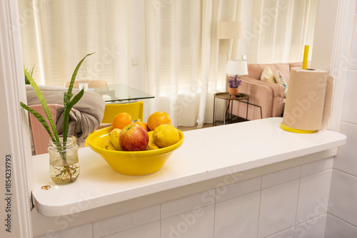 Kitchen counter bar separating living room space