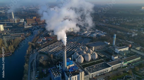 plant emitting smoke, impacting global climate change. Nice aerial view drone