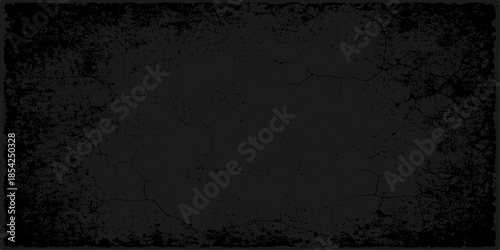 A dark antique concrete wall with a rough black grunge texture provides a blank aged paper backdrop featuring a vintage dirty pattern and grungy metal rust art