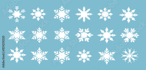 Snowflakes on a light blue background for winter designs