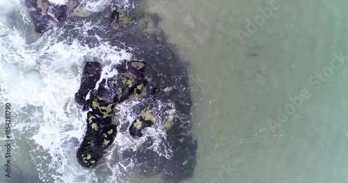 Aerial Top Down View of Waves on Mossy Rocks The Concept of Relaxation