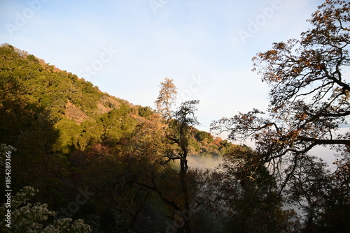 Stunning sunrise from a mountain top over the clouds