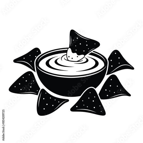 A black and white image of a bowl of dip with tortilla chips a silhouette
