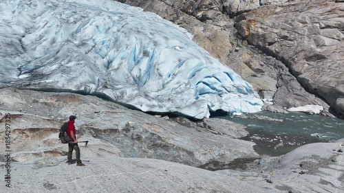 Climber Explores Norwegian Glacier Landscape in a Remote Mountain Area