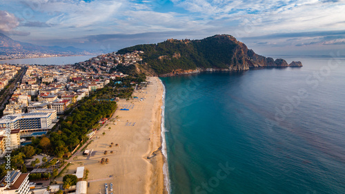 Drone view of Cleopatra Beach and Alanya Castle, cloudy weather, Turkey