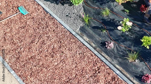 Gardening at Home in the Yard With Fresh Plants and Irrigation System