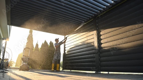 Cleaning a Patio Shade Structure Using Pressure Washer