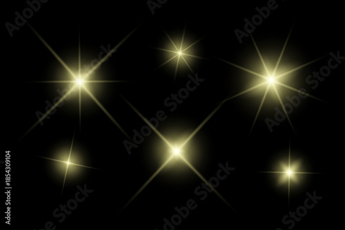 Golden sparkle  lights, flashing lights, light effects, sunlight lens flare, glowing ray beams, sparkling starsicon on black background.