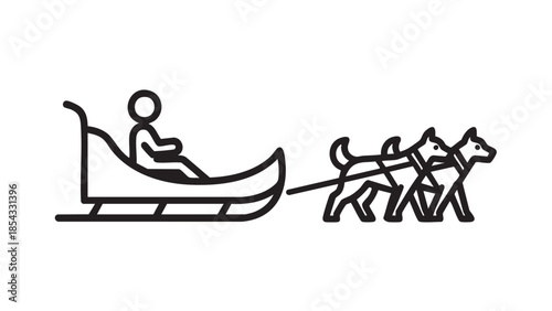 A person rides a dog sled pulled by three huskies in a winter landscape viewed from the side