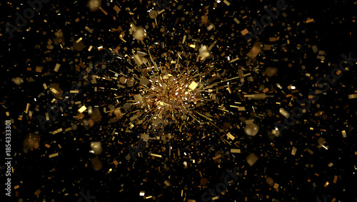 Explosion of golden confetti against a black background