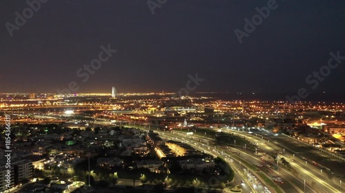 Wallpaper Mural Aerial night view of King Abdulaziz Road and Jeddah city skyline with traffic Torontodigital.ca