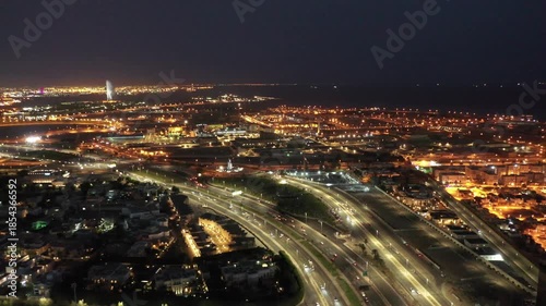 Wallpaper Mural Aerial night view of King Abdulaziz Road and Jeddah city skyline with traffic Torontodigital.ca