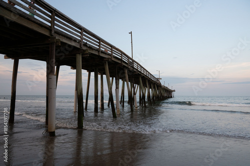 Wallpaper Mural Under the pier at Virginia Beach with ocean waves Torontodigital.ca