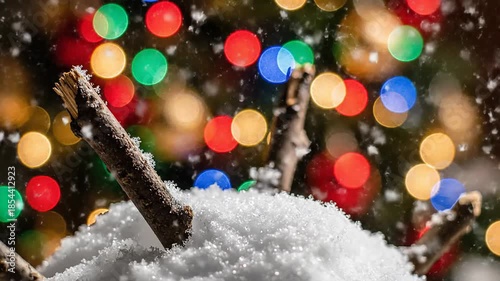 Winter snow scene with festive holiday bokeh lights twinkling gently