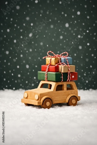Wooden toy car loaded with festive gift box stacks driving in winter snow, celebration and holiday season travel concept, perfect for new year and christmas gift promotions