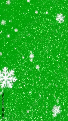 Winter Snowfall Overlay Effect on Vibrant Green Background With Falling Snowflakes And Bokeh Lights