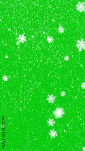 Falling Snowflakes Overlay on Vibrant Green Screen Background for Winter Holidays Animation and Visual Effects