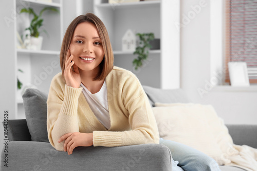 Beautiful young woman with ...